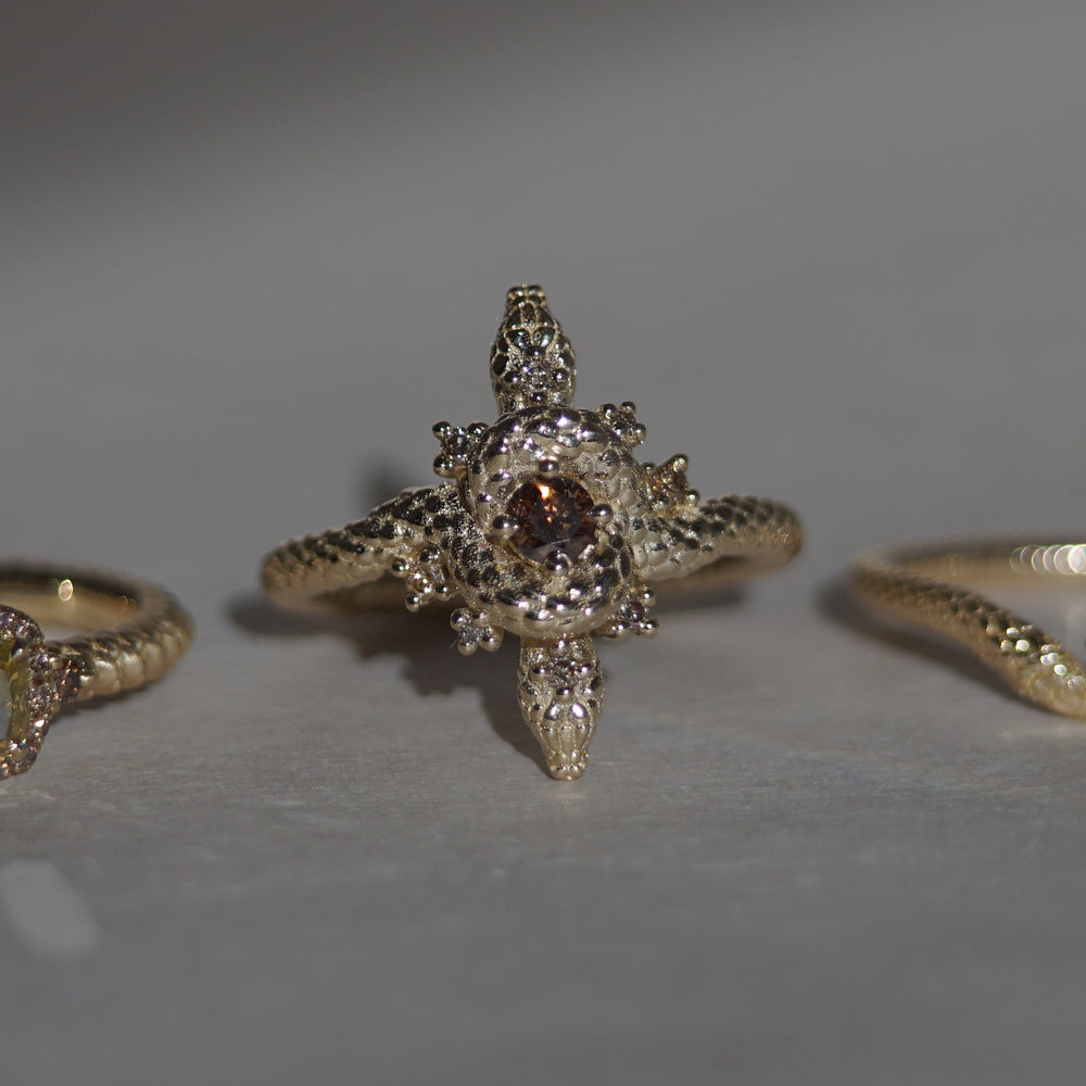 
                  
                    Double Snakes Knot Ring
                  
                